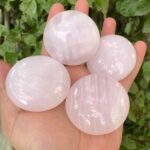 Beautiful Quality UV-Reactive Pink Mangano Calcite Round Palm Stone
