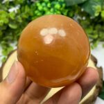 310g Beautiful Red Honey Calcite Sphere