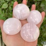 Beautiful Quality UV-Reactive Pink Mangano Calcite Round Palm Stone
