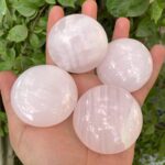 Beautiful Quality UV-Reactive Pink Mangano Calcite Round Palm Stone