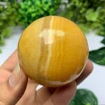 265g Beautiful Mango Calcite Sphere