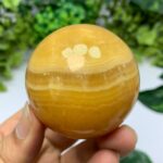 265g Beautiful Mango Calcite Sphere