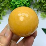 230g Beautiful Mango Calcite Sphere