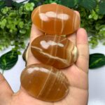 Beautiful Red Honey Calcite Palm Stone