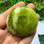 110g Best Quality Transparent Jade Round Palm Stone